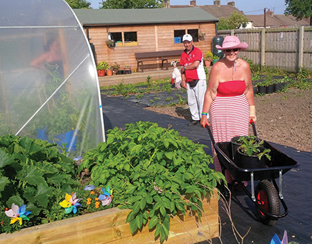 Users of the community garden were keen to try out the new wheelbarrows. Wheelbarrows