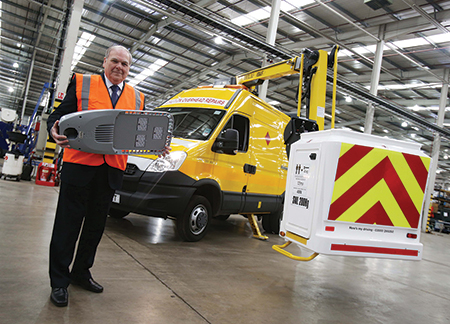 Councillor Brian Stephens with one of the new LED street lights. streetlighting cabinet
