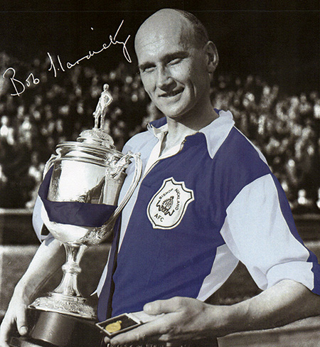 Bob Hardisty with the FA Amateur Cup and his winners' medal in April 1955, after Bishop Auckland had beaten Hendon 2-0 in the Wembley final in front of a capacity 100,000 crowd. amateur-football