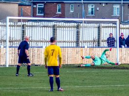 Marske United's Robert Dean saves Matty Roberts' penalty. Photo: Martyn Tweddle.