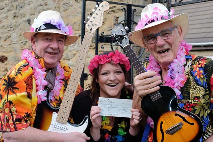 The Babe Magnets, Jim Tait and Alan Prudhoe present Dementia Care Worker, Rowena Carr with a cheque for £1,500. The Babe Magnets, Jim Tait and Alan Prudhoe present Dementia Care Worker, Rowena Carr with a cheque for £1,500.