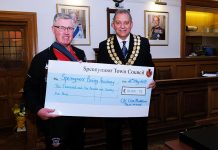 Former Mayor hands over funds to chosen charity Former Mayor of Spennymoor, Cllr Clive Maddison presents a cheque for £10,001.75 to Robert Ellis of Spennymoor Boxing Club.