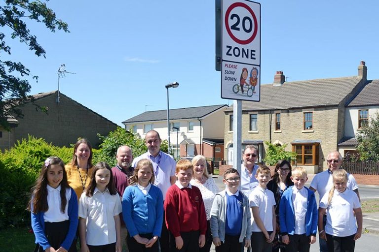 Children worked with illustrator Liz Million to produce the new signs.