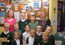 St Charles pupils stand tallest in growing challenge Benjamin, Kaden, Anya, Emily, Eliza, Aiden, James, India, Poppy and Tobias from St Charles with their teaching assistants Mrs Ingleby and Mrs Beard.
