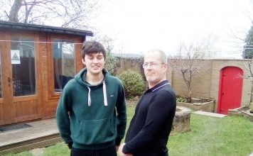 Fundraising for sensory garden Creative Support care workers Ryan Johnson (left) and Steve Dobson pictured in the garden.