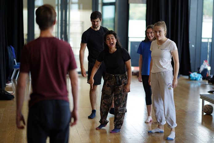 Cameron Ashplant (Ralph) and Layla Chowdhury (Jack) square up to each other during rehearsals of Lord of the Flies