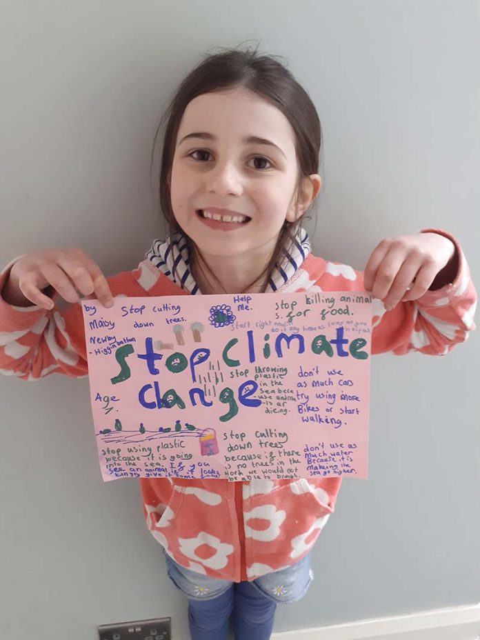 Maisy Newby-Higgingbottom, aged 7, has a climate change message for the world. Maisy Newby-Higgingbottom, aged 7, has a climate change message for the world.