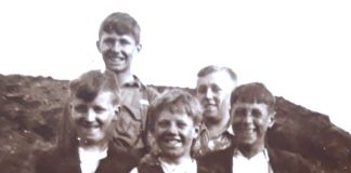 Can you help identify the mystery people in the photograph? Who are the mystery people in the photograph?