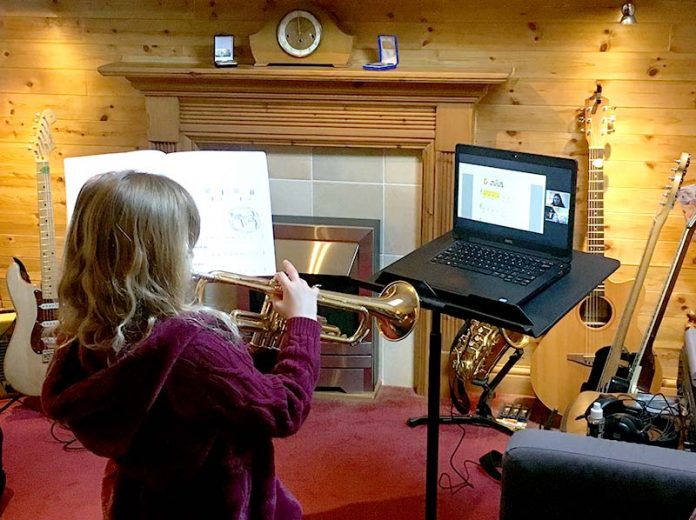 Melanie Henderson takes part in a music lesson with Durham Music Service brass teacher Amy Leggett. Melanie Henderson takes part in a music lesson with Durham Music Service brass teacher Amy Leggett.