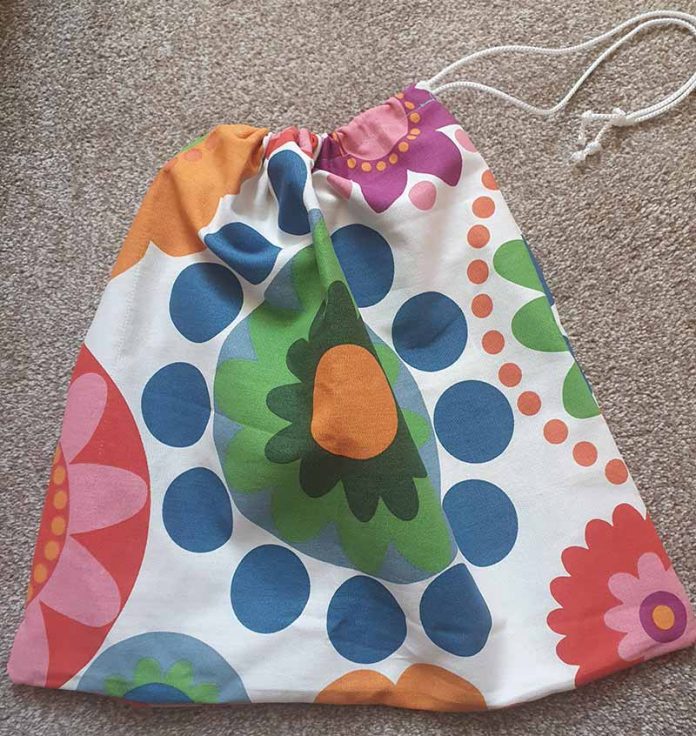A scrub bag, made by Learning Curve tutor, Rebecca Pattinson. A scrub bag, made by Learning Curve tutor, Rebecca Pattinson.