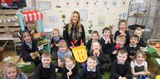 Everything’s Rosa in the garden after donation Ex-pupil and Grass Direct Marketing Operative Jessica Fox in the Rosa Street School garden area with the whole of the reception class.