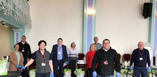 Town Council provides final care packages before project handover Council staff and members make up care packages at the Town Hall.