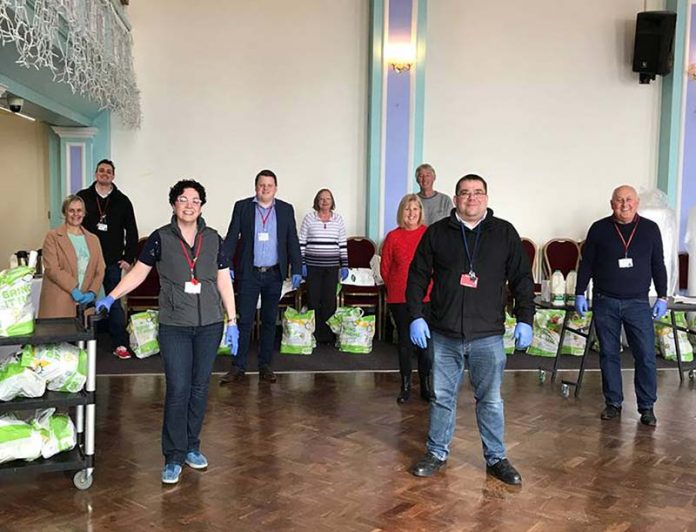 Council staff and members make up care packages at the Town Hall. Council staff and members make up care packages at the Town Hall.