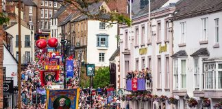 Miners’ Gala exhibition moves online to mark 136th celebration Crowds pass under the balcony of the County Hotel and along Old Elvet at the 2019 Durham Miners' Gala.