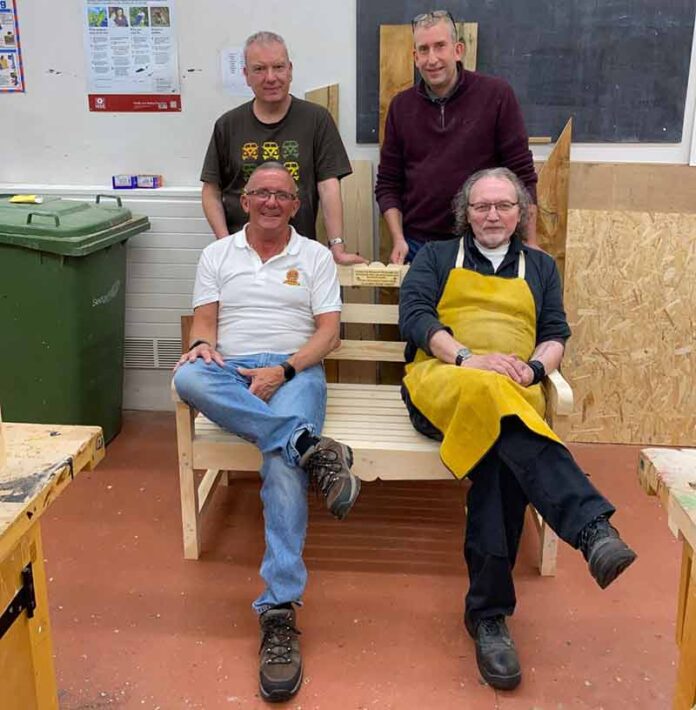 Mark McGuire, Andy Denholm, Alan Curry and Gary Weatherston enjoy a well-earned rest on one of the benches.