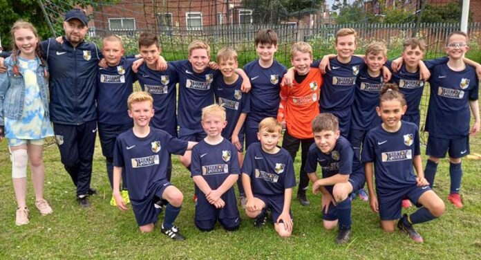 Champions: Bishop Juniors U11s have won their 9v9 league.