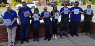 Endeavour receives funding Endeavour holding cards that read out thank you