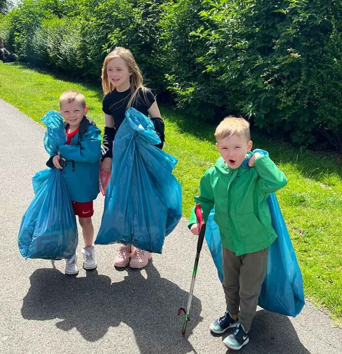 litter-pick Alfie Mortimer, Freya Abs and Kobe Longstaff helping out at the community litter pick.
