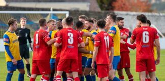 Shildon struggle in Stocksbridge Shaildon AFC and Stocksbridge Park Steels players argue.