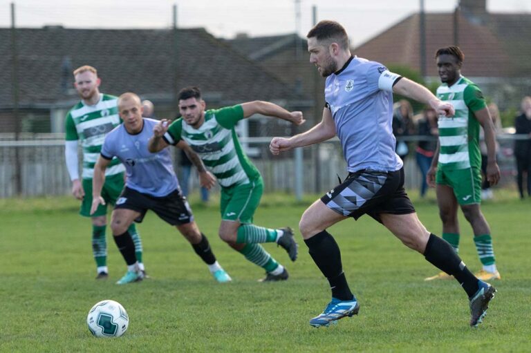 Craig Gott scores from the penalty spot.