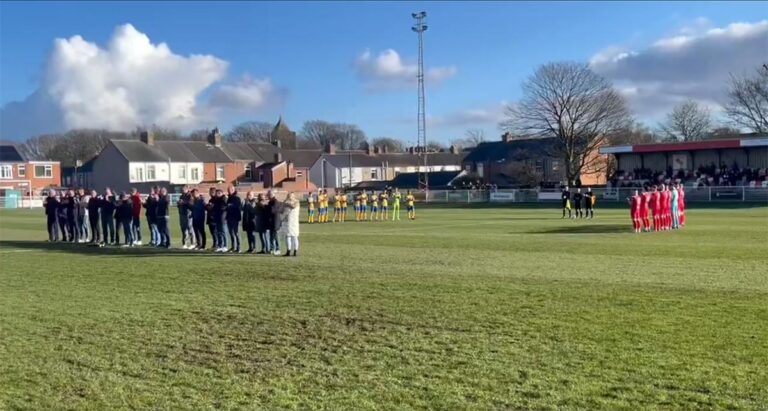 Players past and present join in a minute's applause for Lee Hainsworth.