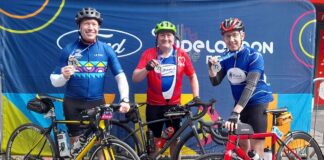 Three roosters on their bikes