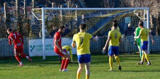 Railwaymen rack up the goals to climb table