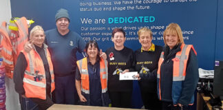 Husqvarna employees donate £180 to Busy Bees