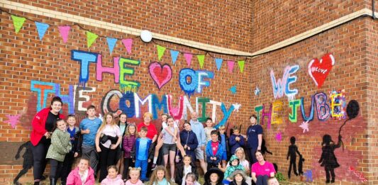 Local artist brings Community Centre to life with colourful new muralĀ