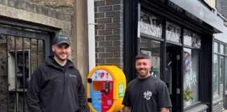 Waxx installs community defibrillator
