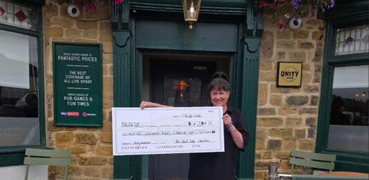 Red lion raises funds to help solve kids’ cancer