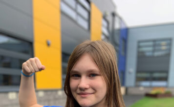Lucy lifts 180kg to break world record